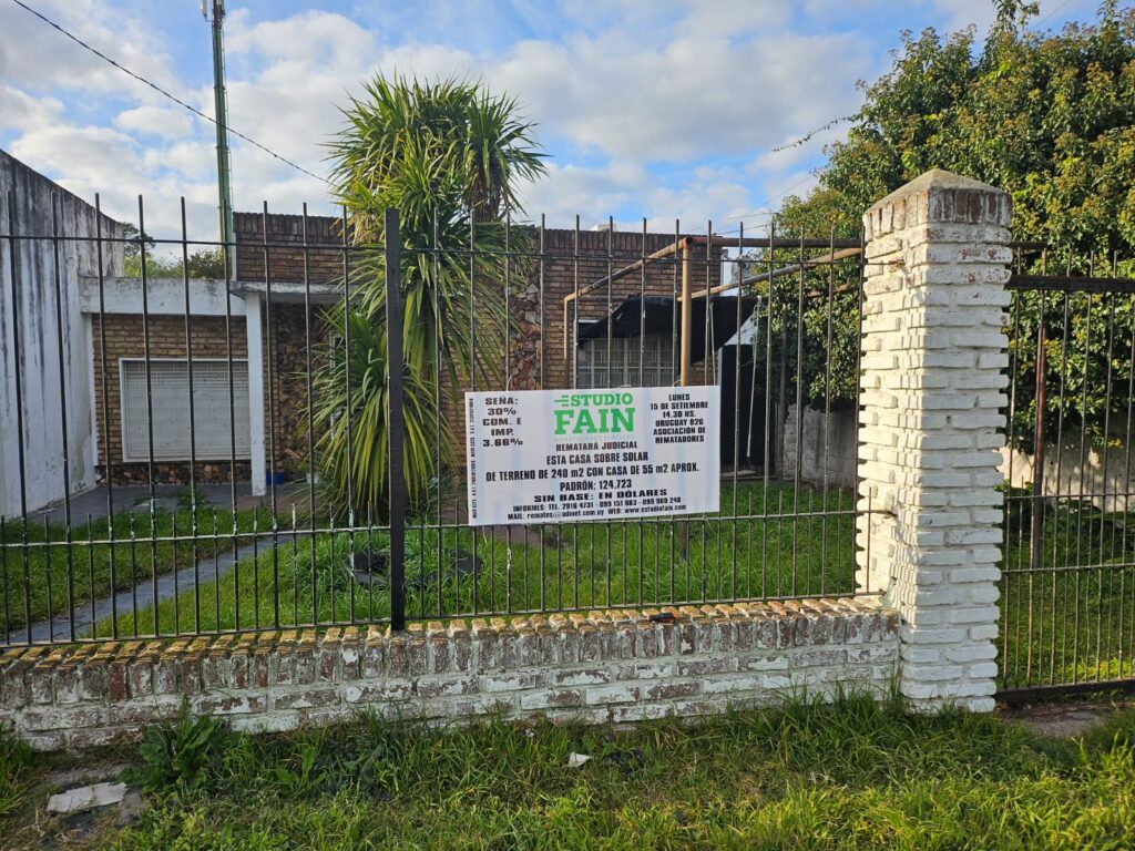 Solar de terreno con mejoras en Nuevo París
